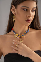 Collier foulard tressé bleu orange charm soleil étoile acier