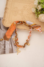 Collier foulard tressé orange breloques acier inoxydable