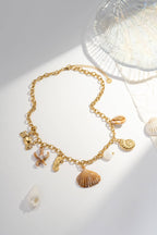 Collier en acier inoxydable à breloques  coquillages