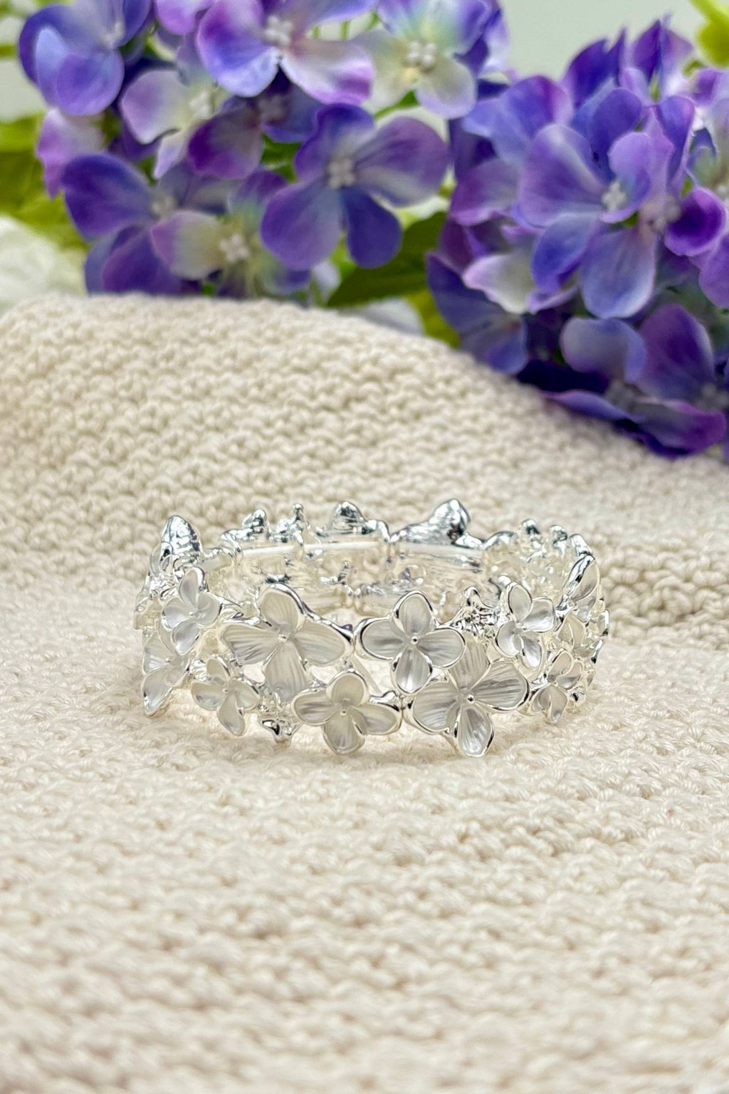 Bracelet fleurs coloré avec élastique 324CP22