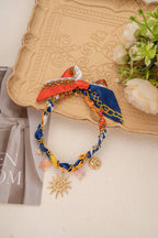 Collier foulard tressé bleu orange charm soleil étoile acier