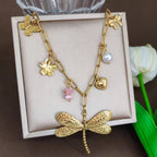Collier acier inoxydable charms papillon fleur libellule